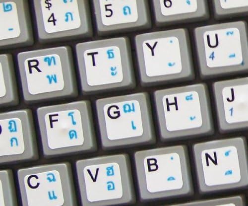Etiquetas de teclado de netbook inglesas tailandesas no fundo branco