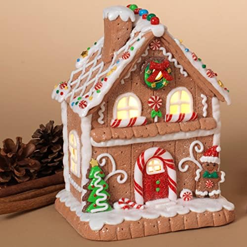Um feriado de 7,5 polegadas de 7,5 polegadas LED Christmas Faux Gingerbread House Fatuine com sotaques de homens e doces-decoração