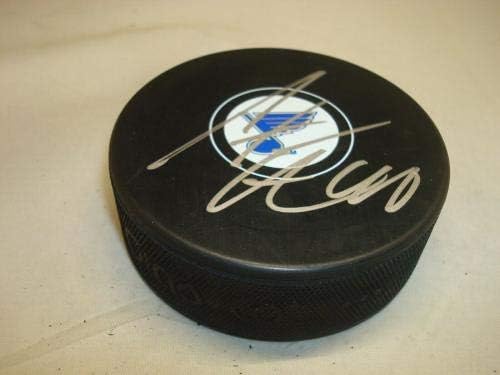 Carter Hutton assinou o puck de hóquei do St. Louis Blues autografado 1a - Pucks autografados da NHL