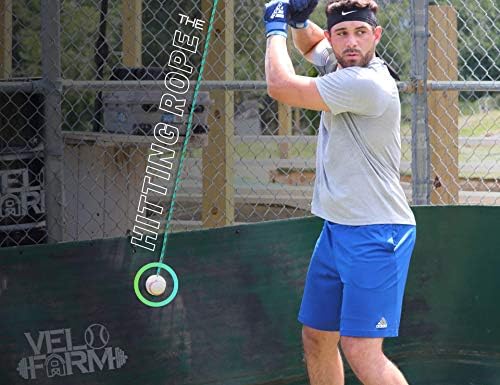 O bastão de bastão de beisebol de corda - sistema de treinadores de rebatidas - combina camiseta e jogada frontal em