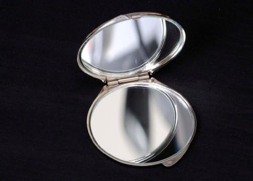 Sea Gems Compact Mirror em um design de redemoinhos celtas.
