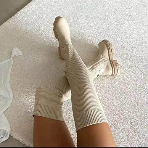 Botas de malha de alongamento da coxa, coxa de botas altas redondas no calcanhar de dedão do dedo médio esticadas sobre as botas