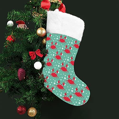 Caranguejos engraçados dançando meias de meia pendurada para a decoração da casa de férias em lareira de Natal