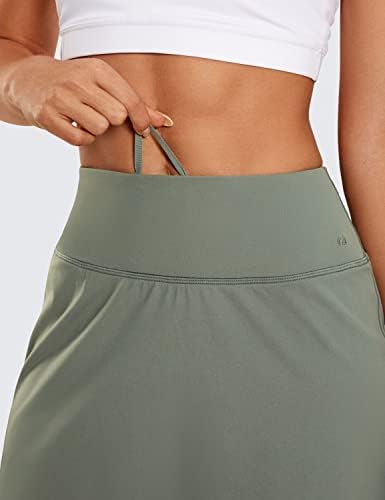Crz Yoga Salia feminina Saias de tênis de golfe com bolsos de zíper estiquem mais leves atléticos casuais correndo skorts cinza sálvia médio