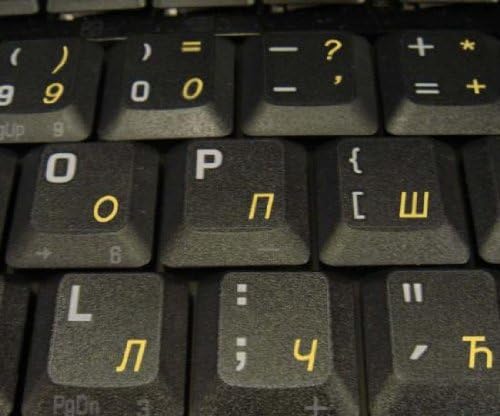 Decalques do teclado sérvio com fundo transparente de letras amarelas
