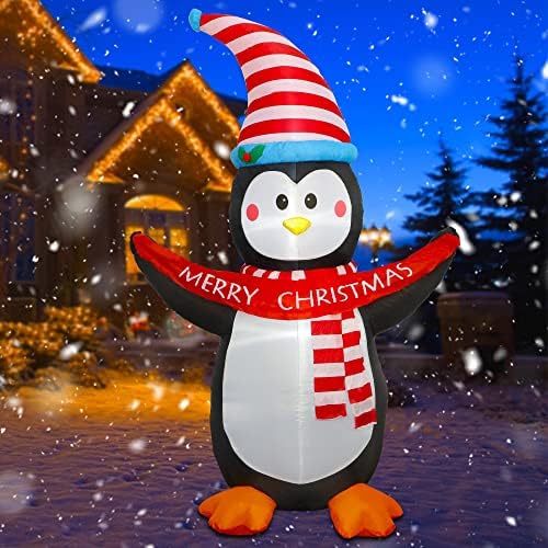 Decorações infláveis ​​de Natal GLINTOPER, infláveis ​​de 6 pés iluminados Penguin Hold Feliz Christmas Banner, explodir