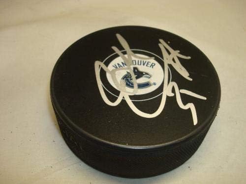 Eddie Lack assinado Vancouver Canucks Hóquei Puck autografado 1b - Pucks autografados da NHL
